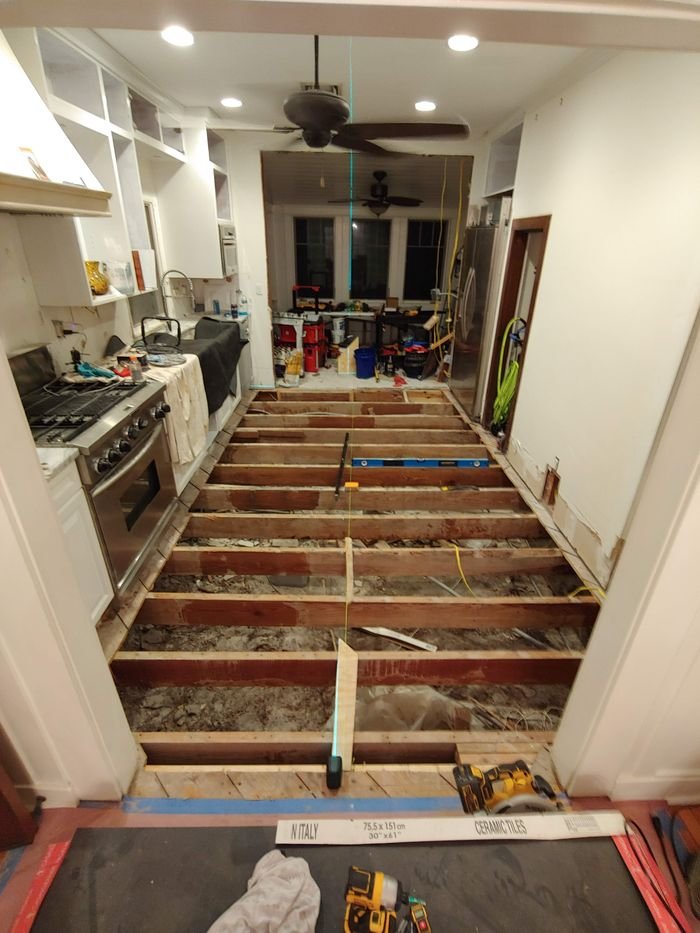 New floor framing with exposed joists